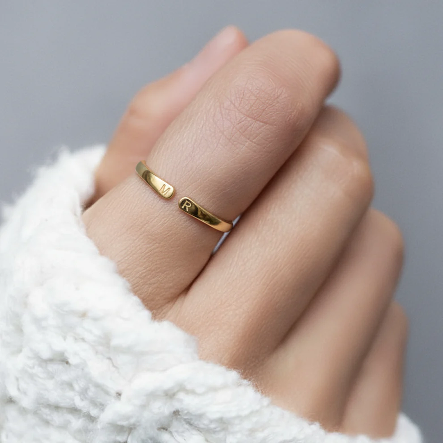 Justerbar initialring hvisken